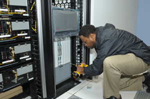 DCRI engineer installs unit