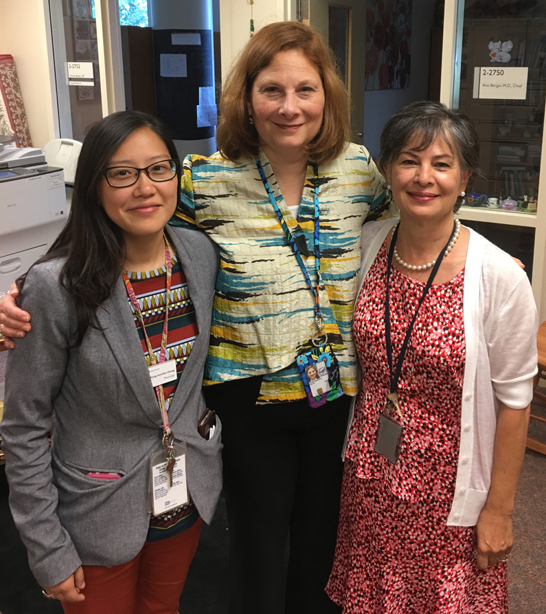 Three women involved in the mindfulness program standing together
