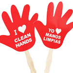 A paper cutout of a hand shape with a stick on the end. Text on the paper says I [heart] clean hands