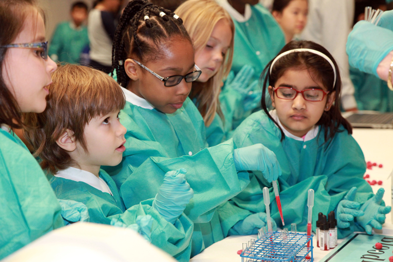 Children participate in Take Your Child to Work Day Hematology Lab