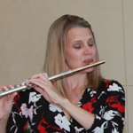 Julianna Nickel playing the flute