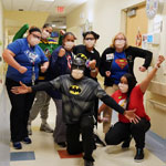 Members of the NIH Clinical Center Recreational Therapy program dressed in Halloween costumes
