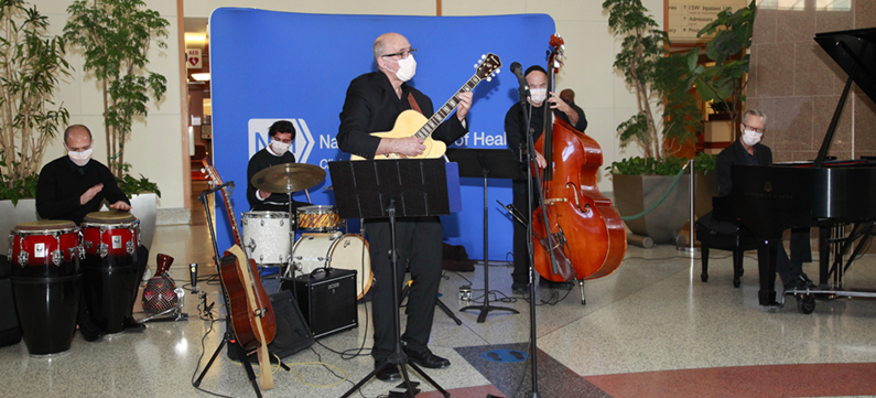 Five University of Maryland Jazz Combo musicians perform in the Clinical Center Atrium