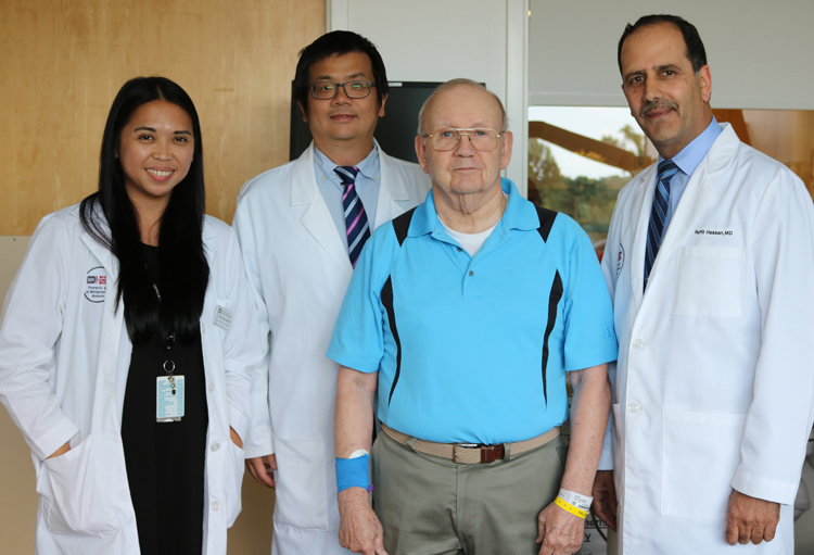Keith Grant (second from right) poses with his doctors.