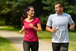 A male and female jogging